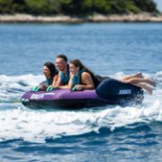 Crew Demonstrating The Compact Footprint And Easy Storage Of The Jobe Sports Scout 3 Towable Tube Towable Inflatable