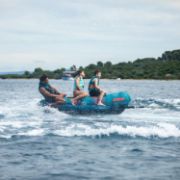 The Jobe Sports Chaser 3 Towable Tube Towable Inflatable Arranged On A Superyacht Beach Club Platform
