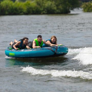 Charter Guests Enjoying The Compound 3 Towable Tube, High-End Water Sports Equipment From Yacht Toys™