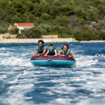 The Jobe Sports Droplet 3 Towable Tube Towable Inflatable Arranged On A Superyacht Beach Club Platform