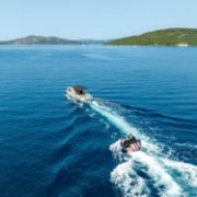 Charter Guests Enjoying The Scout 3 Towable Tube, High-End Water Sports Equipment From Yacht Toys™
