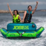 Guests Enjoying The Jobe Sports Binar 2 Towable Tube On The Ocean, Ride Seated Or Chariot Style. Super-Easy To Climb Back Into. Fast Inflate And Connect. 3 Year Warranty.