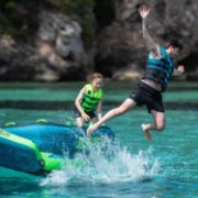 Yacht Crews Quickly And Easily Deploying The Premium Binar 2 Towable Tube Towable Inflatable From The Swim Platform