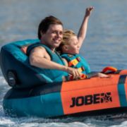 Yacht Crews Quickly And Easily Deploying The Premium Proton 2 Towable Tube Towable Inflatable From The Swim Platform
