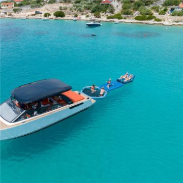 Guests Enjoying The Jobe Sports Switch 2 Towable Tube On The Ocean, A Great Towable And Slide In One. Hours Of Fun For All Ages. Fast Inflate And Connect. 3 Year Warranty.