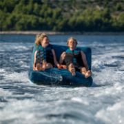 Yacht Crews Quickly And Easily Deploying The Premium Switch 2 Towable Tube Towable Inflatable From The Swim Platform
