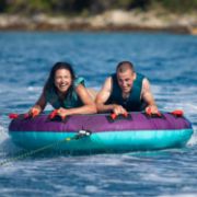 Yacht Crews Quickly And Easily Deploying The Premium Droplet 2 Towable Tube Towable Inflatable From The Swim Platform