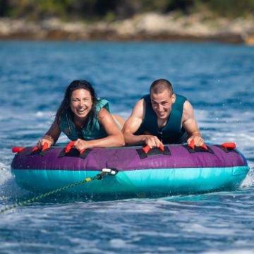 Yacht Crews Quickly And Easily Deploying The Premium Droplet 2 Towable Tube Towable Inflatable From The Swim Platform