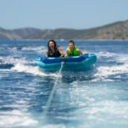 Yacht Crews Quickly And Easily Deploying The Premium Airstream 2 Towable Tube Towable Inflatable From The Swim Platform