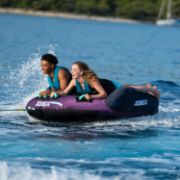Guests Enjoying The Jobe Sports Scout 2 Towable Tube On The Ocean, Amazing Fun For Your Guests. Super-Easy To Climb Back Into. Fast Inflate And Connect. 3 Year Warranty.