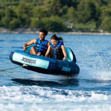 Crew Demonstrating The Compact Footprint And Easy Storage Of The Jobe Sports Proton 2 Towable Tube Towable Inflatable