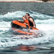 Crew Demonstrating The Compact Footprint And Easy Storage Of The Jobe Sports Tribal 2 Towable Tube Towable Inflatable