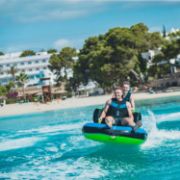 The Jobe Sports Swath 2 Towable Tube Towable Inflatable Arranged On A Superyacht Beach Club Platform