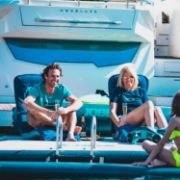 Crew Demonstrating The Compact Footprint And Easy Storage Of The Jobe Sports Chair Towel Midnight Blue Lounger