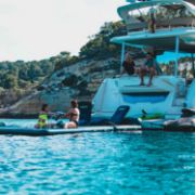 Charter Guests Enjoying The Infinity Comfort Chair, High-End Water Sports Equipment From Yacht Toys™