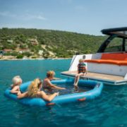 Crew Demonstrating The Compact Footprint And Easy Storage Of The Jobe Sports Infinity Water Hammock Platform