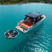 Charter Guests Enjoying The Infinity Water Hammock, High-End Water Sports Equipment From Yacht Toys™