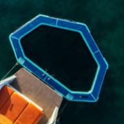 Profile View Showing The Sleek Engineering And Premium Design Of The Jobe Sports Infinity Pool Platform