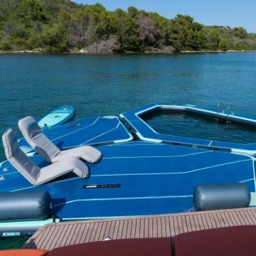 Charter Guests Enjoying The Infinity Island, High-End Water Sports Equipment From Yacht Toys™