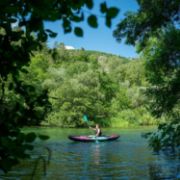 Crew Demonstrating The Compact Footprint And Easy Storage Of The Jobe Sports Croft Kayak