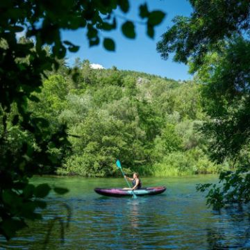 Crew Demonstrating The Compact Footprint And Easy Storage Of The Jobe Sports Croft Kayak