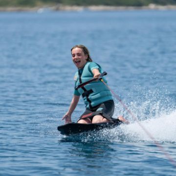 Crew Demonstrating The Compact Footprint And Easy Storage Of The Jobe Sports Slash Kneeboard