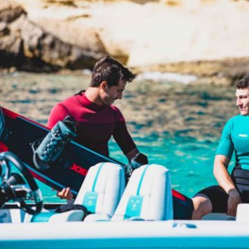 Charter Guests Enjoying The Perth 3/2Mm, High-End Water Sports Equipment From Yacht Toys™