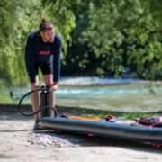 Crew Demonstrating The Compact Footprint And Easy Storage Of The Jobe Sports Triple Action Sup Pump