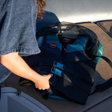 Crew Demonstrating The Compact Footprint And Easy Storage Of The Jobe Sports Ventilated Storage Bag Multipurpose