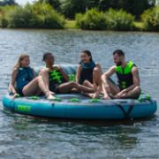 Crew Demonstrating The Compact Footprint And Easy Storage Of The Jobe Sports Compound Towable 4P Towable Inflatable