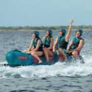 The Jobe Sports Chaser Towable 4P Towable Inflatable Arranged On A Superyacht Beach Club Platform