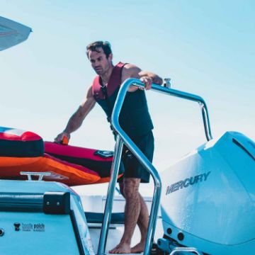 Charter Guests Enjoying The Unisex Neoprene Vest, High-End Water Sports Equipment From Yacht Toys™