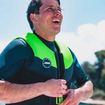 The Jobe Sports Unisex Neoprene Vest Buoyancy Aid Arranged On A Superyacht Beach Club Platform