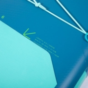 Crew Demonstrating The Compact Footprint And Easy Storage Of The Jobe Sports Sava Aero Sup Paddleboard