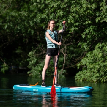 Crew Demonstrating The Compact Footprint And Easy Storage Of The Jobe Sports Mohaka Hybrid Sup Paddleboard